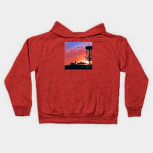 Disc Golf Against a Reddish Sunrise Kids Hoodie